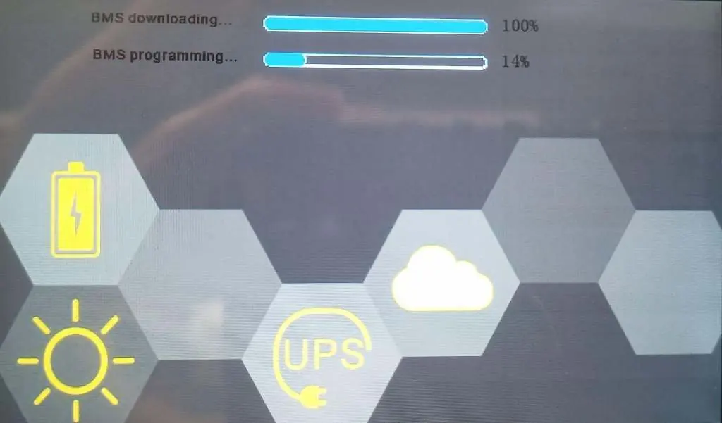 Inverter screen showing BMS programming progress.