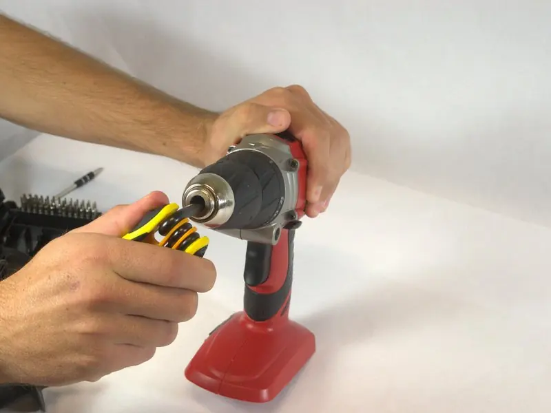 Using the T40 Torx key to remove the chuck sleeve