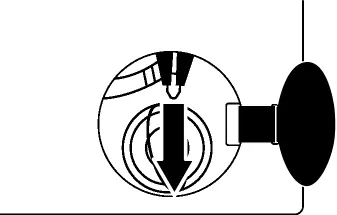 Insert the tool into the filter cover to begin the opening process.