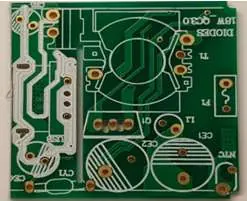 Bottom side of the PCB highlighting the layout of conductive paths.