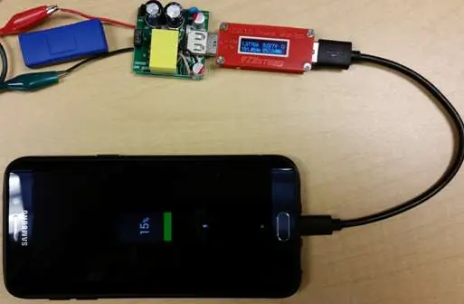 Setup for testing the charger with a mobile device.