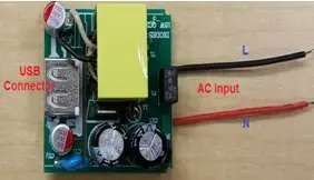Identification of AC input and USB output connection points.