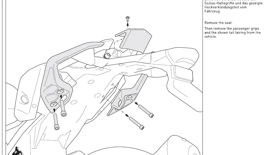Removing seat and tail fairing components.