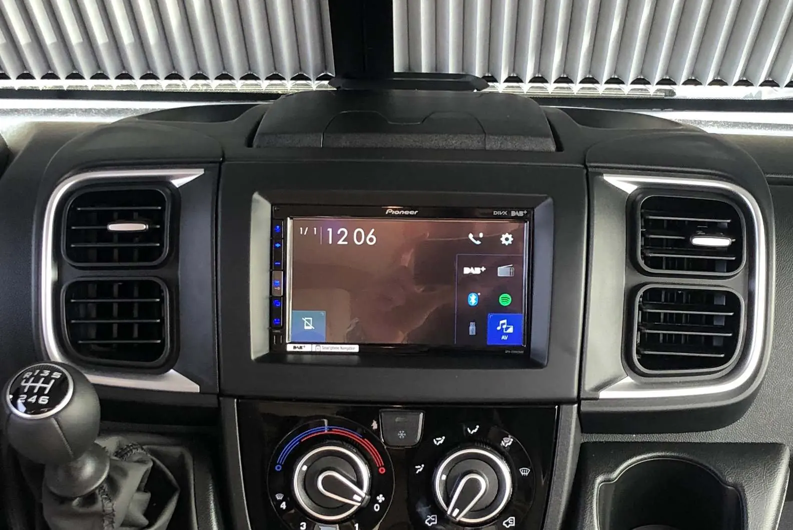 Final installation of the radio faceplate.