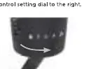 Unlocking the tool by rotating the control dial.