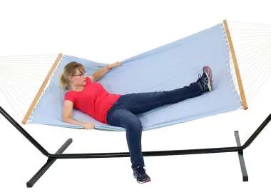 Step 3: Lifting legs into the hammock.