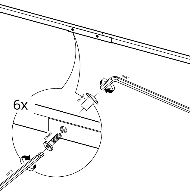 Securing the frame with screws and hex key.