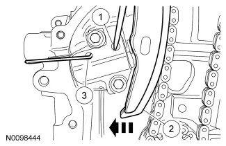 Compressing the timing chain tensioner using a pick and paper clip.