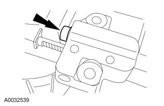 Compressing the timing chain tensioner plunger using a vise.