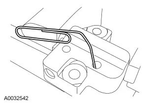Retaining the tensioner with a paper clip.