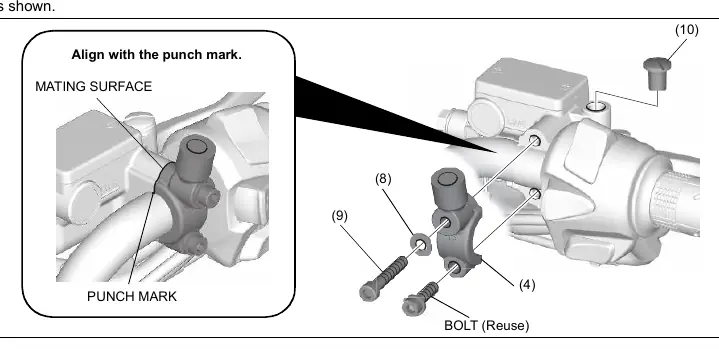 Alignment of the master cylinder holder with the punch mark.