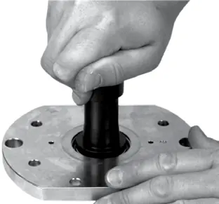 Use tool and press shaft sealing into place.