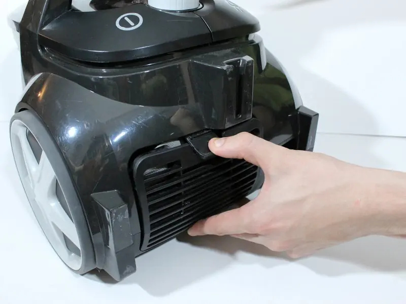 Pull the tab to access the exhaust filter.