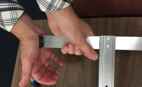 Attaching the end caps to the footpiece.