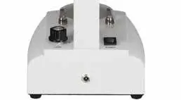 Rear view of the microscope showing power connection and switches