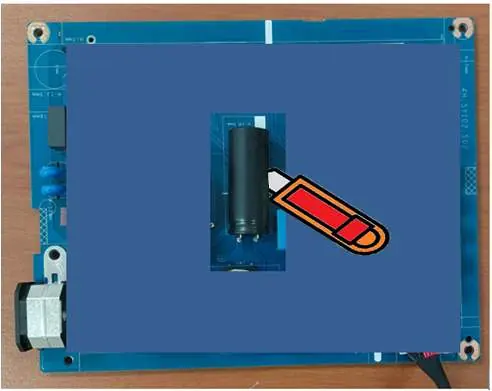 Cutting glue for capacitor removal