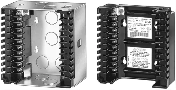 Comparison of Metal Wall-mount subbase (left) and Plastic Wall-mount subbase (right).