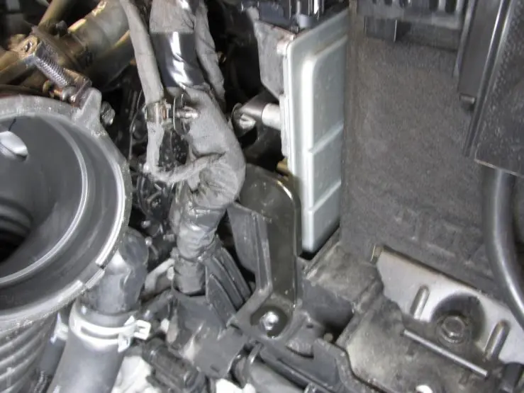 Harness inspection area for Santa Fe (TMa) 2.5L.