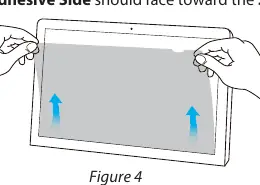 Attaching the privacy filter to the screen.