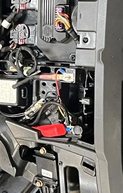 Tapping power and ground to the factory bus bar.