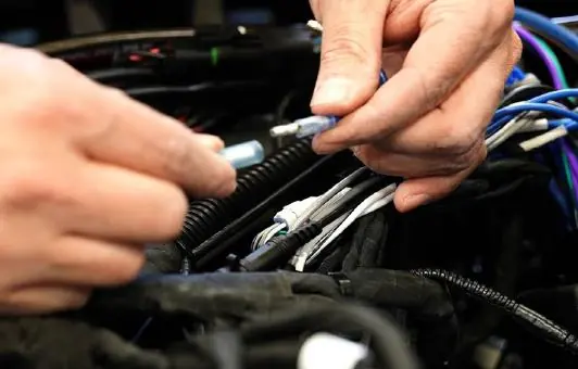 Connecting the amplifier turn-on bullet connectors.