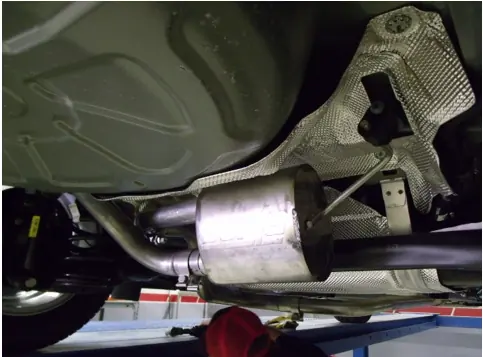 Rear muffler assembly installation