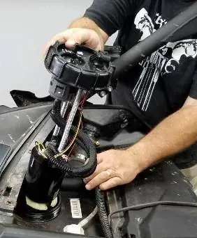 Removing the fuel pump assembly.