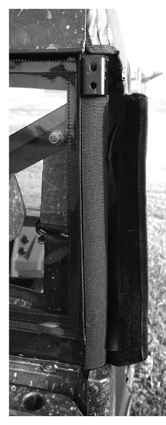 Velcro strip placement down the back of the cage.