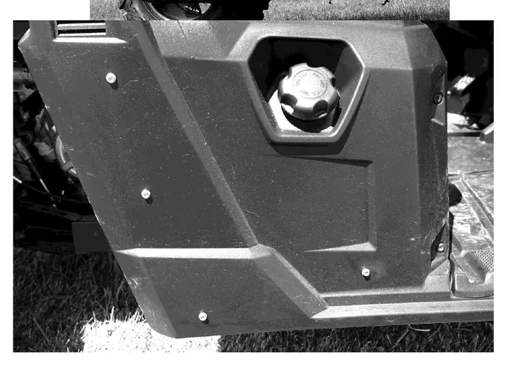 Snap stud installation on the bottom rear portion of the door.