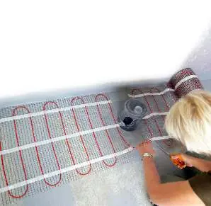 Installing the thin mat on the floor