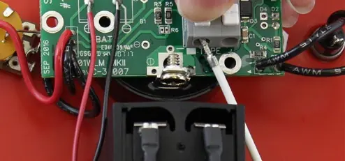 Connecting the tape to the circuit board assembly
