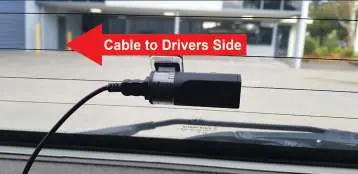 Rear camera installation showing cable routing.