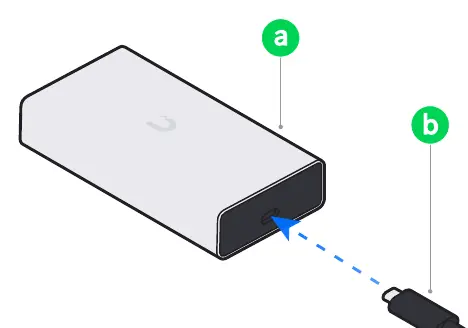 Connecting the USB-C cable to the adapter.