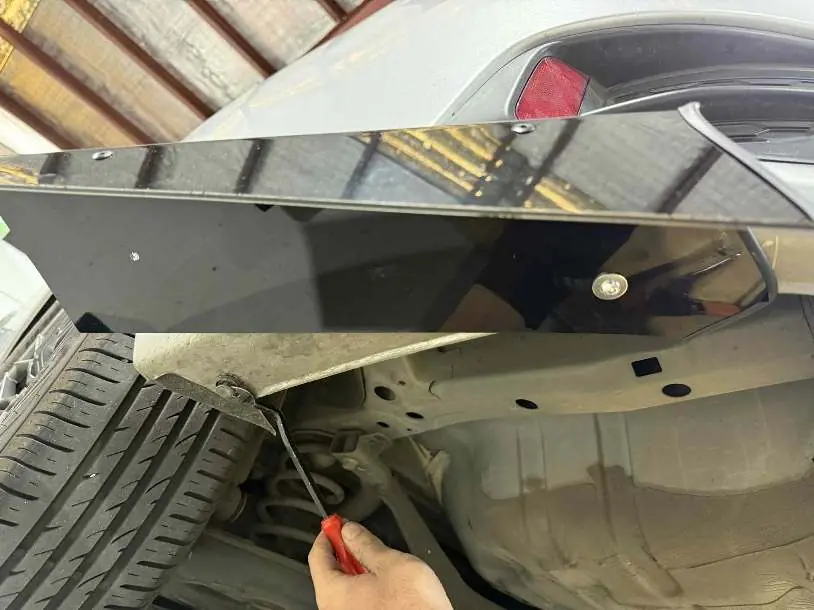 Removing stock clips for side pod fitment