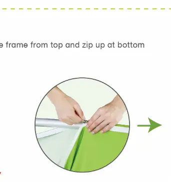 Sliding the fabric banner onto the frame and zipping it at the bottom.