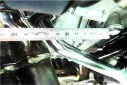 Oil return pipe clearance