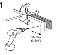 Drilling the mounting holes at a 96 mm distance.