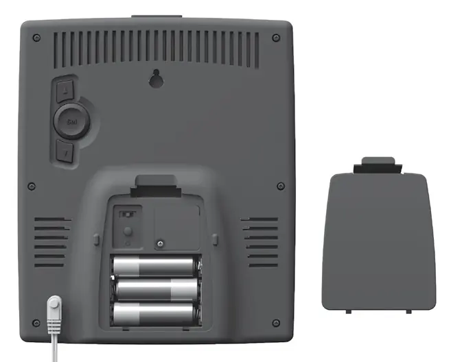 Rear view of the display unit showing battery compartments and control buttons.