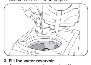 Inserting the charcoal water filter
