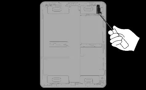 Prying off the rear camera cover.