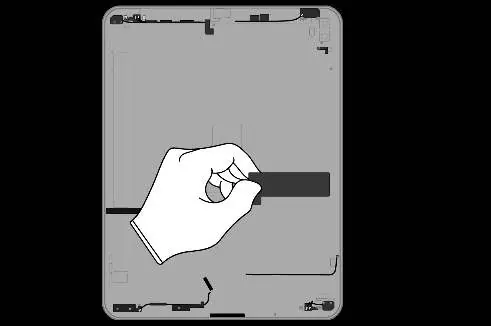 Prying off the Apple Pencil charging coil.
