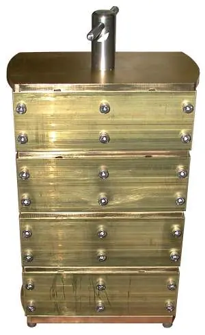 Inspect the dry block assembly with the top handle.