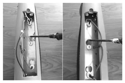 Removing screws to access tubes