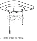 Fixing the adapter plate to the ceiling.