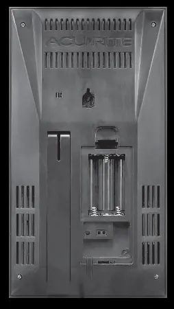 Insert batteries into the back of the display unit.