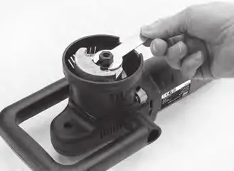 Loosening the backing pad nut