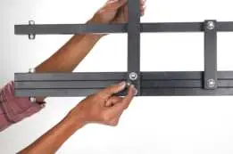 Align and secure the jib arm sections using the provided bolts.