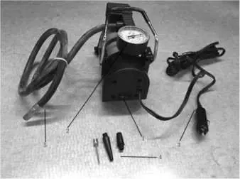 Parts identification: 1. ON/OFF Switch, 2. Pressure Gauge, 3. Power Cord, 4. Adaptors, 5. Air Output Hose.