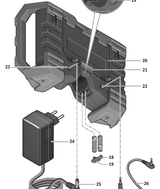 Connection points for power supply and external audio devices.