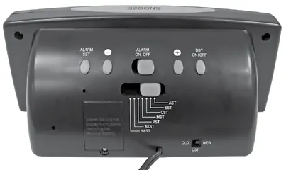 Back of the alarm clock showing control buttons and switches